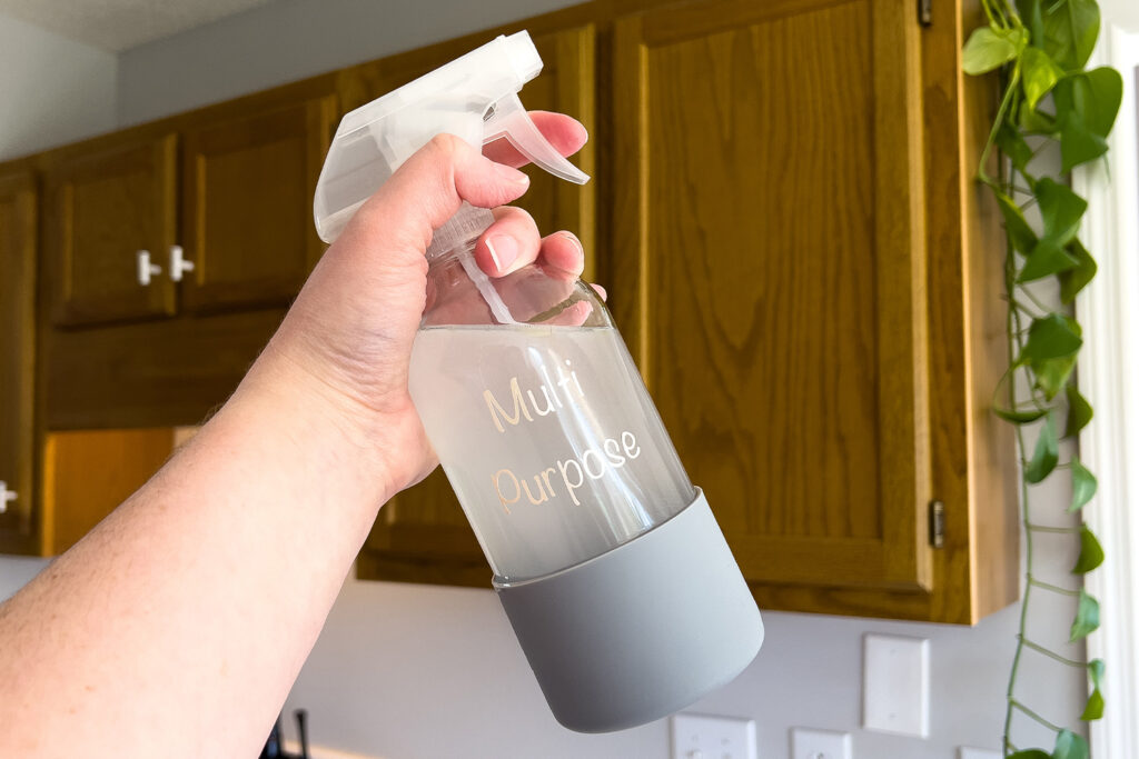 a spray bottle of how to make a multi purpose cleaning spray