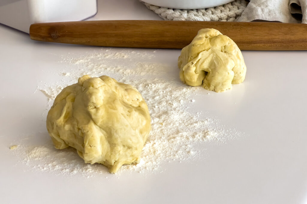 two piles of dough sit on the counter