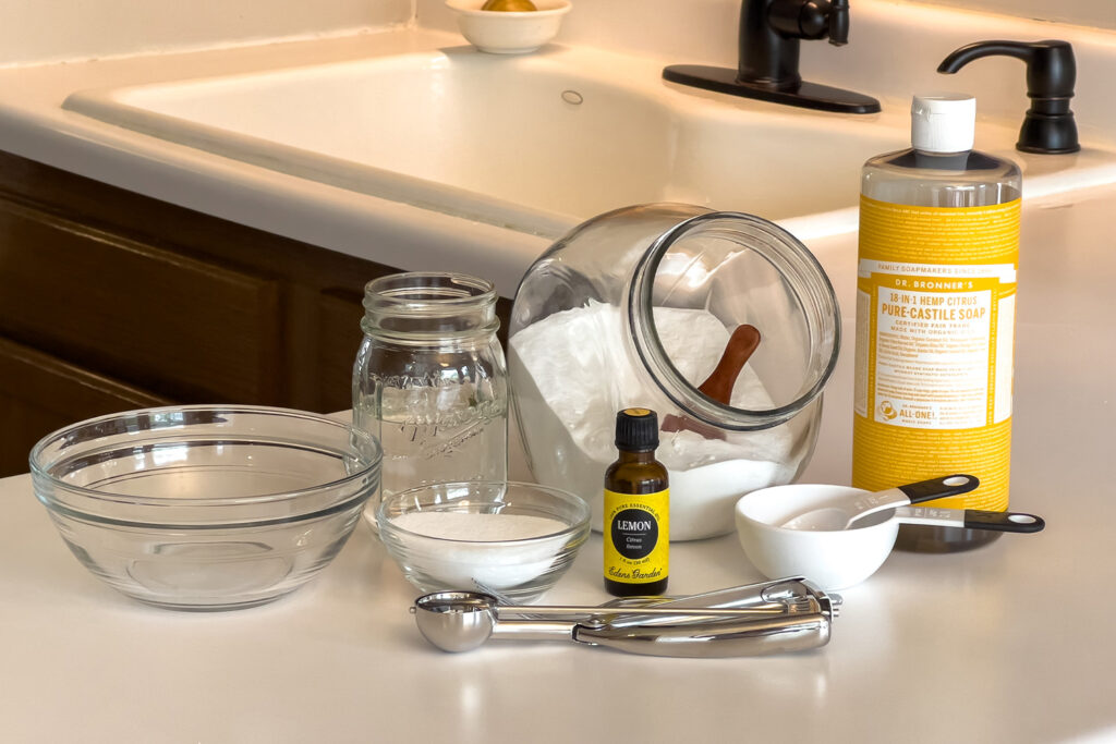 all of the ingredients for diy garbage disposal cleaner pods sit on the kitchen counter