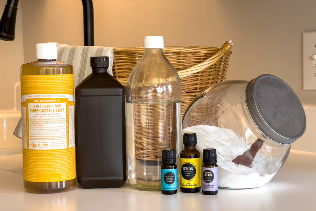 some ingredients to make all natural cleaners in this all natural cleaning guide sit on the counter