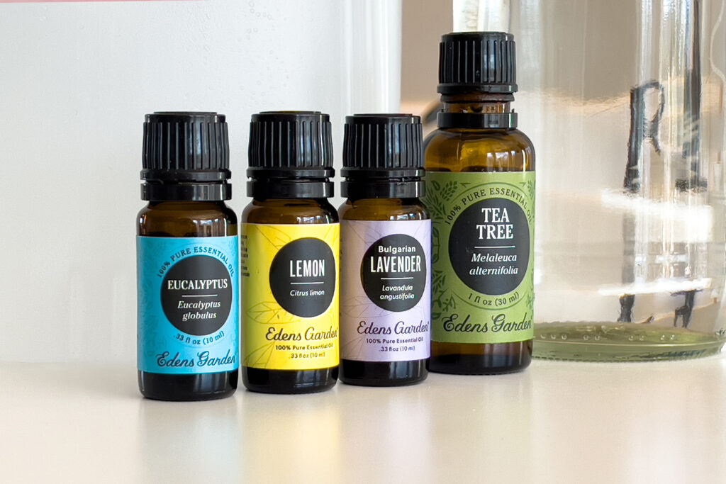 a row of essential oils used in the guide to natural cleaning