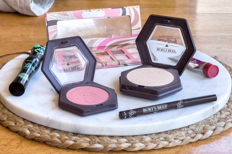 all of the products in the all natural makeup routine sit on the table