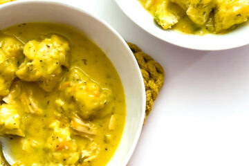 two bowls of sourdough chicken and dumplings