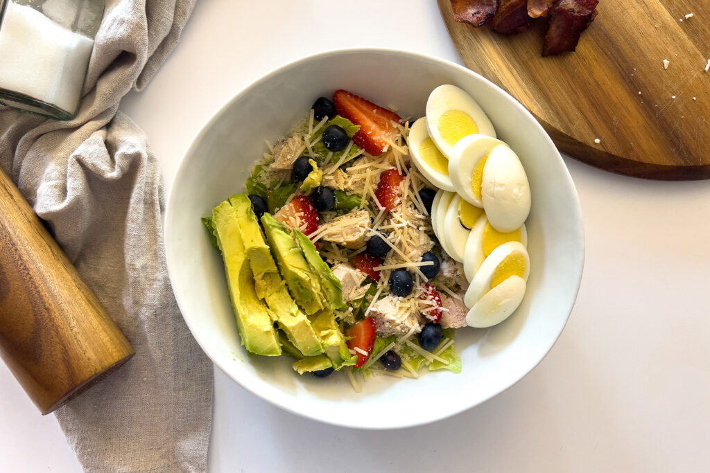egg and avocado in a salad bowl
