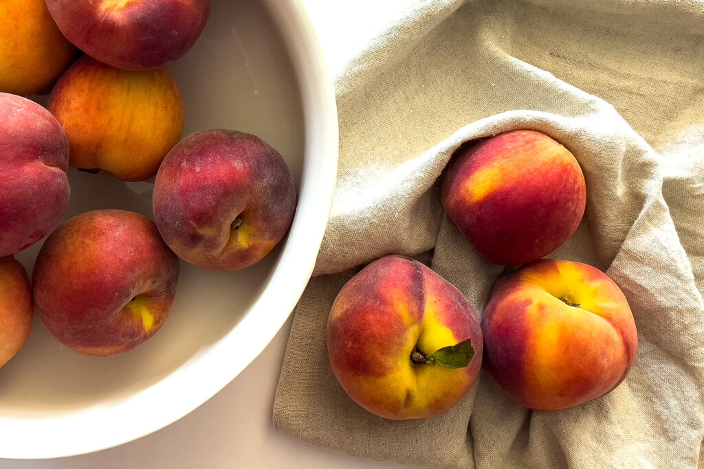 a bowl of fresh peaches