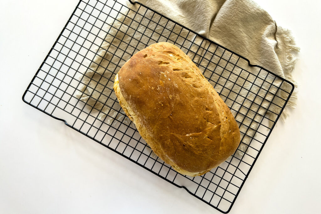 sourdough bread on a cooling rack