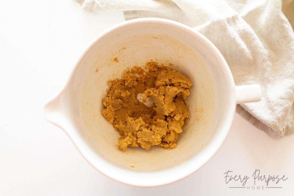 creaming butter and sugar to make sourdough cookies