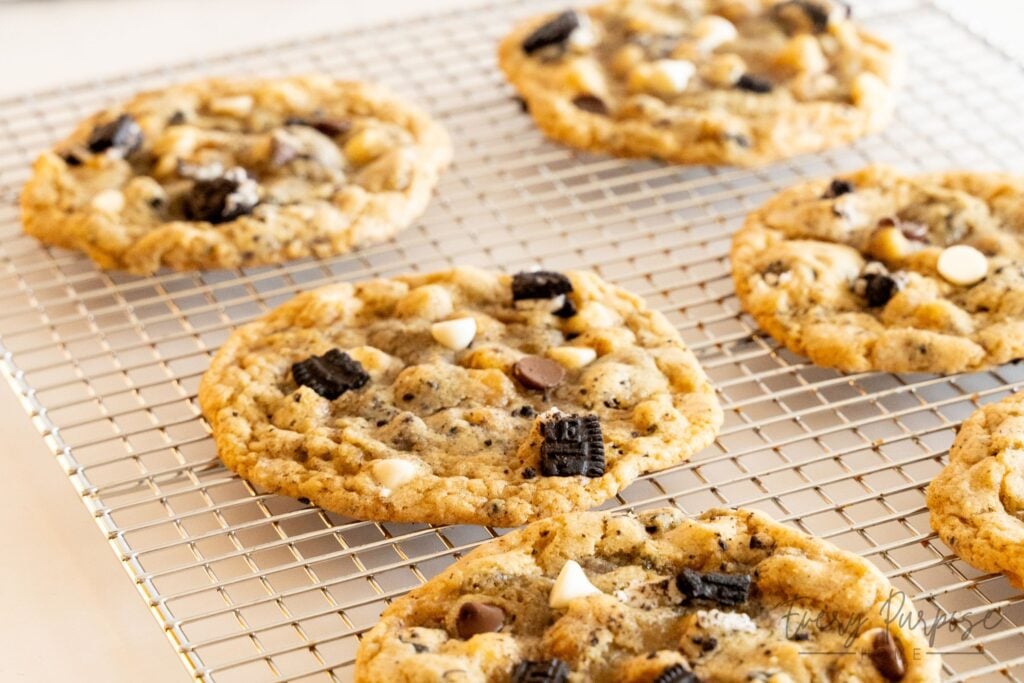 cookies and cream sourdough cookies on cooling rack