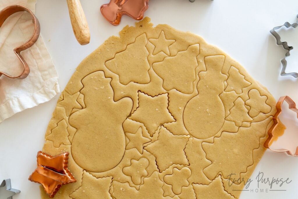 cutting dough with cookie cutters