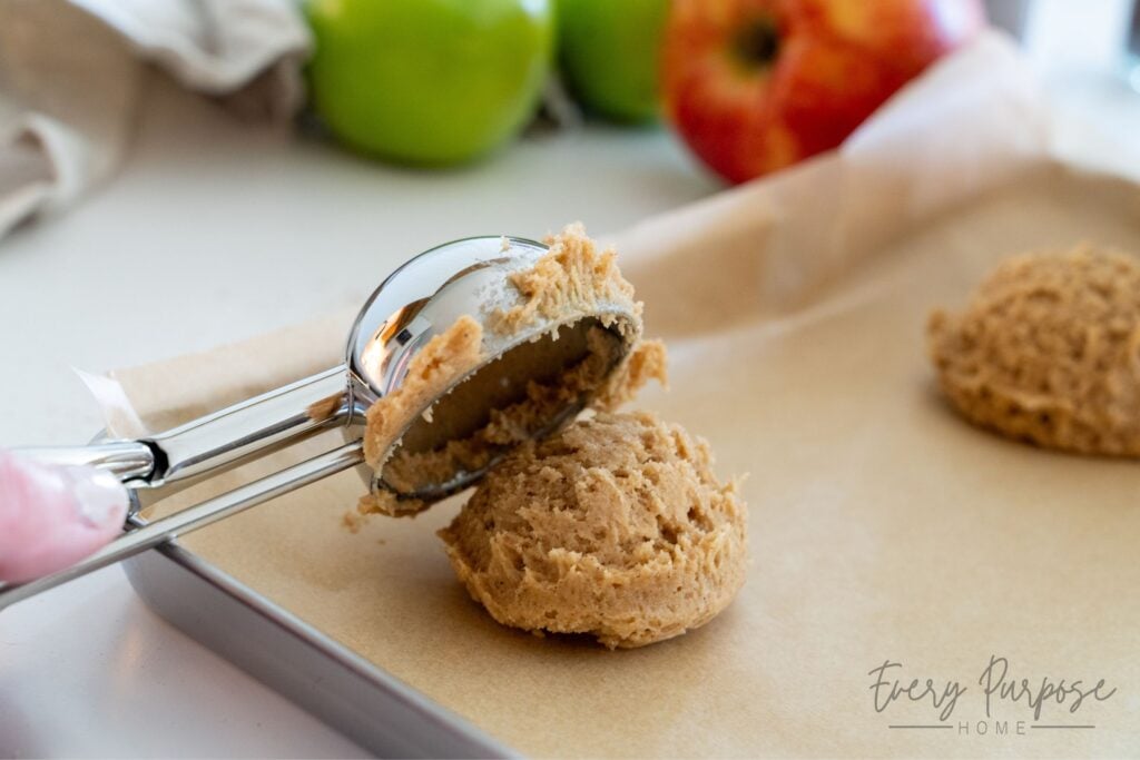scooping apple spice sourdough cookies
