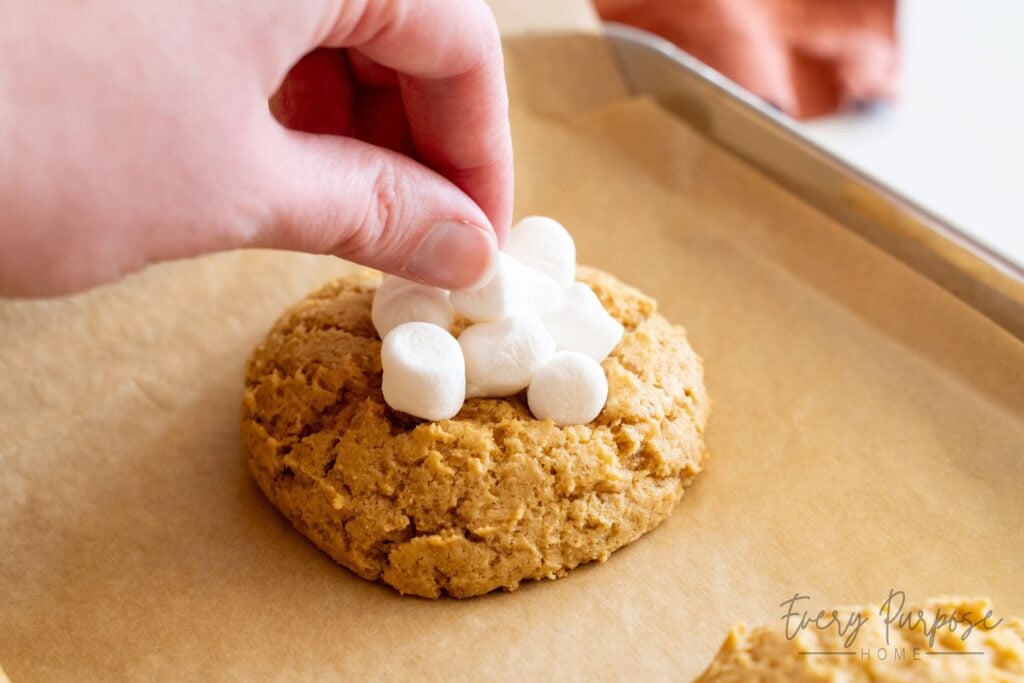 adding marshmallows on top of sweet potato casserole sourdough cookies
