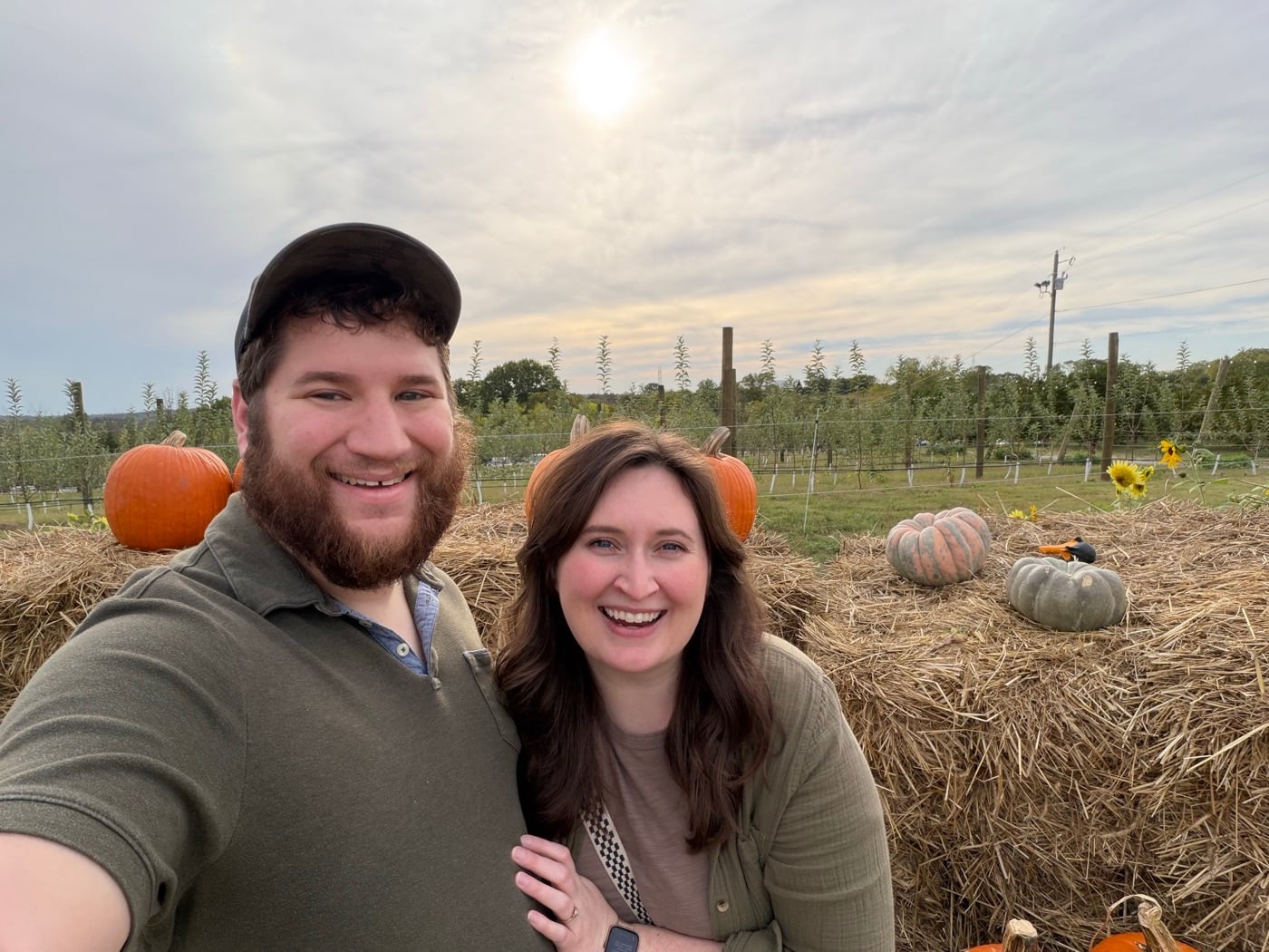 Marlene and her husband Patrick smiling at a pumpkin patch